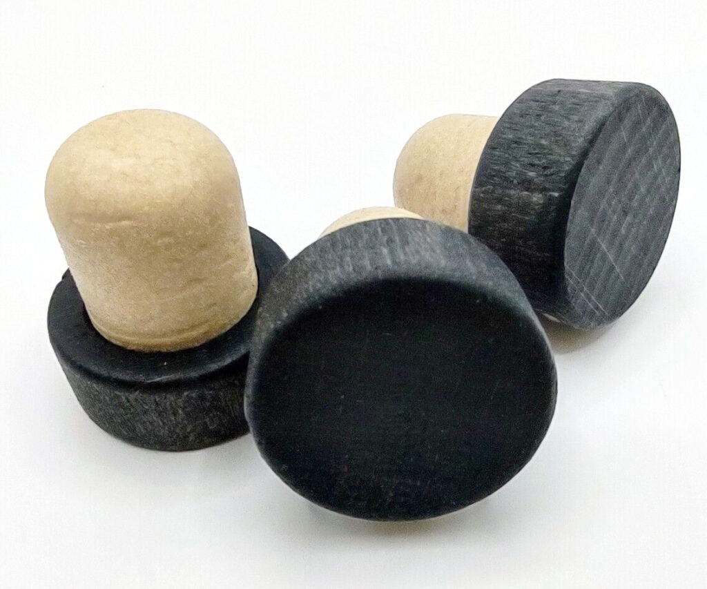 three black Wooden Whiskey Bottle Tops